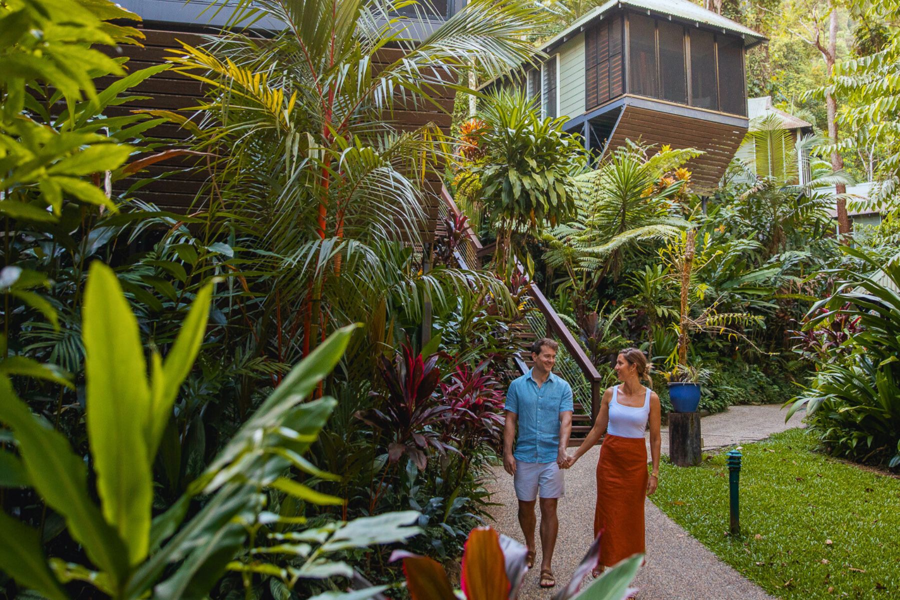 Couple walking through the gardens at Daintree Ecolodge